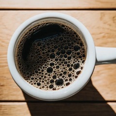 A cup of matcha tea on a table